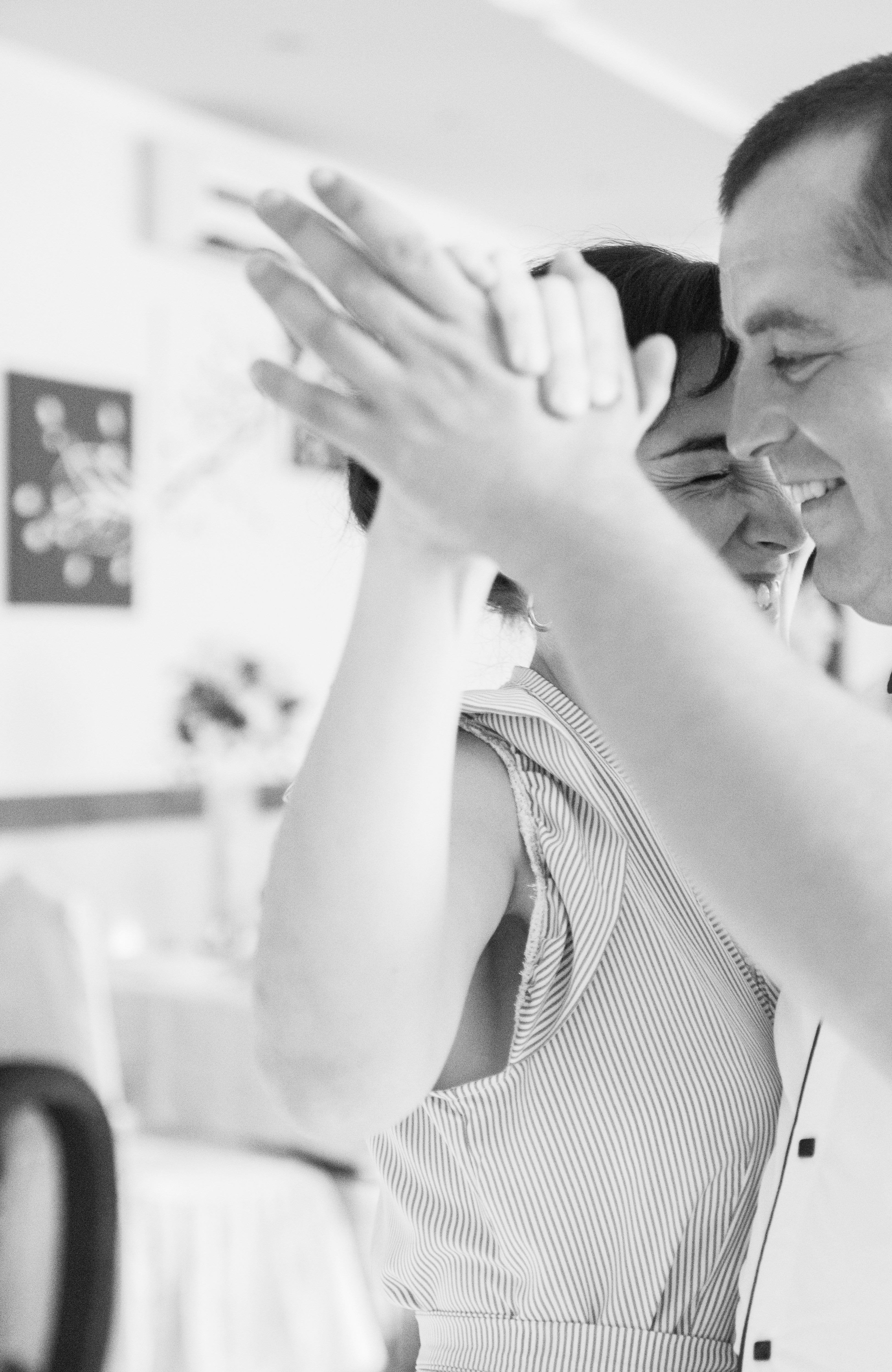 Happy couple dancing in black and white