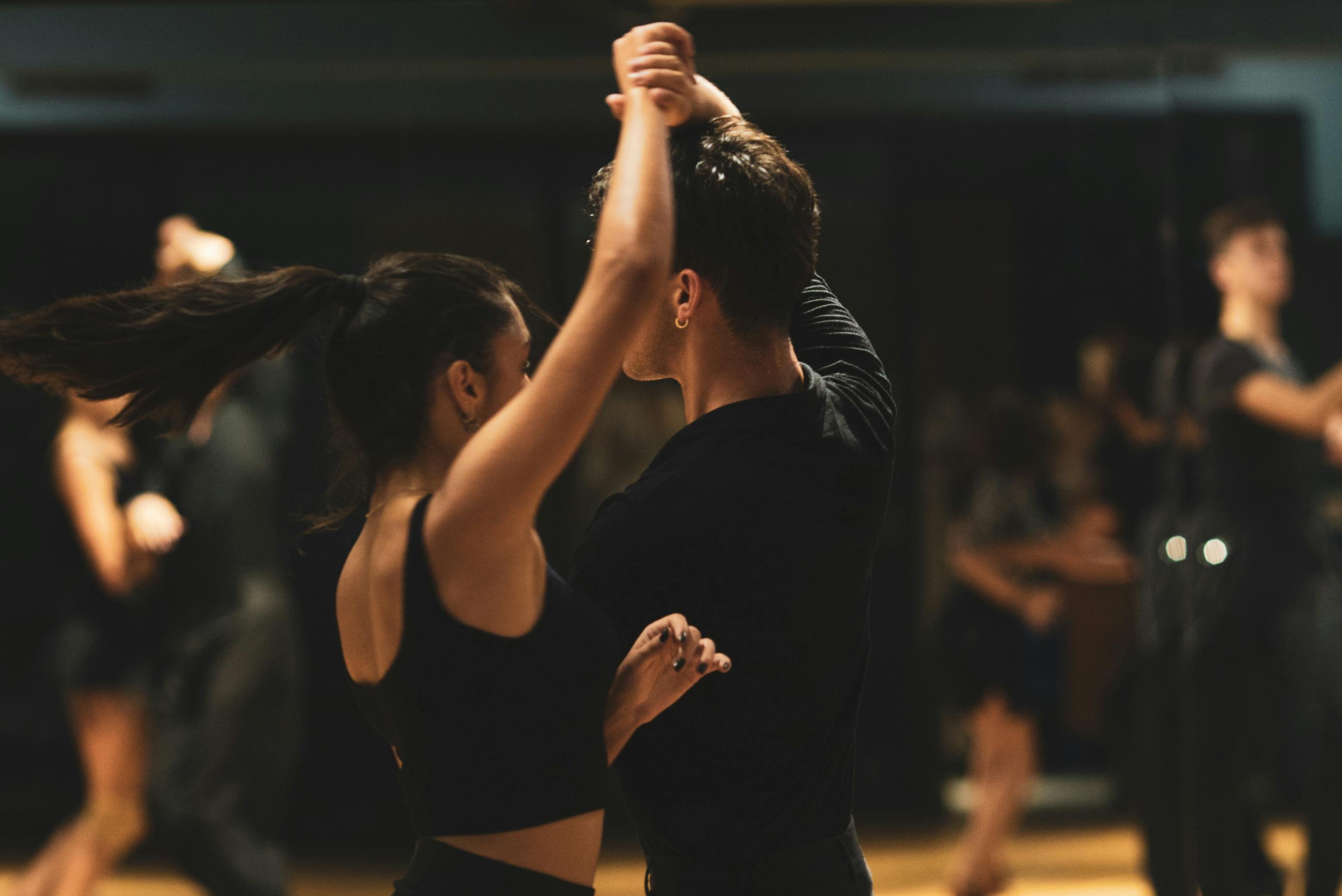 ballroom dance couple spinning at a social dance